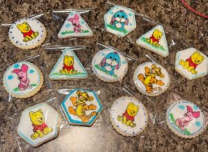 Cookies shaped and decorated like a cartoon character. 