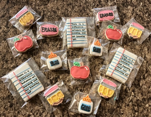 Image of cookies with a school theme. Glue and eraser and paper