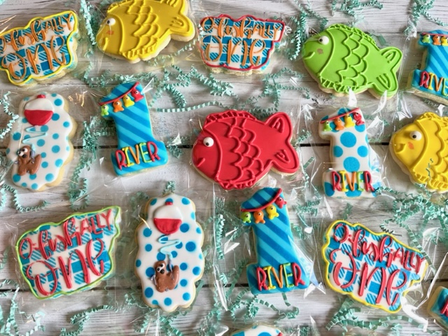 Cookies decorated like colorful fish with different textures.