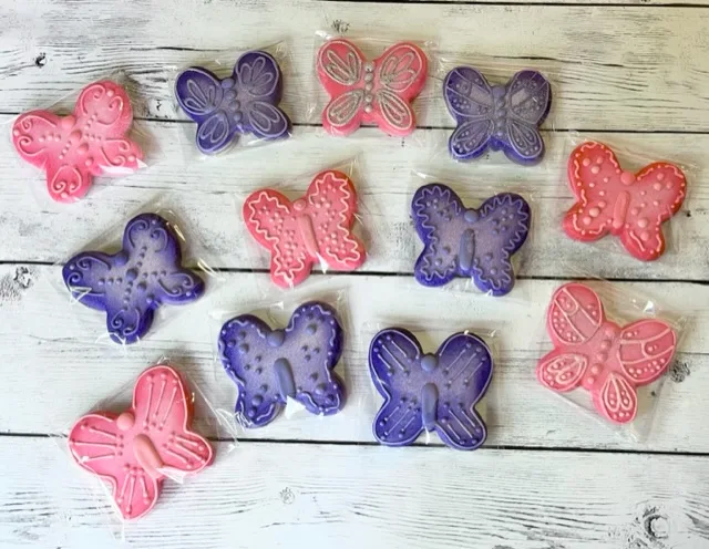 Pink and purple butterfly decorated sugar cookie image. Full set